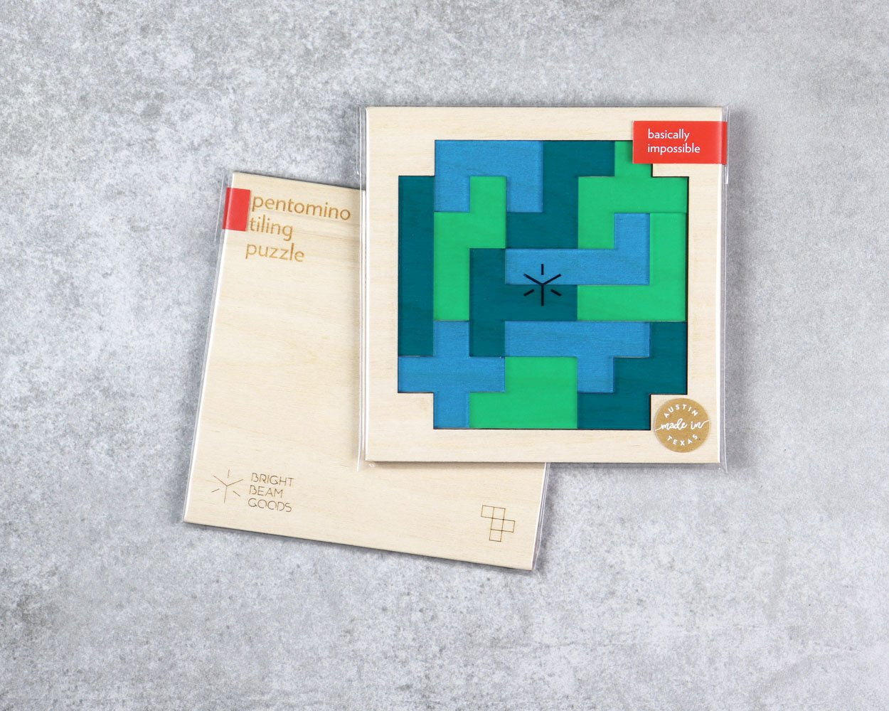 Earth square pentomino puzzle in packaging