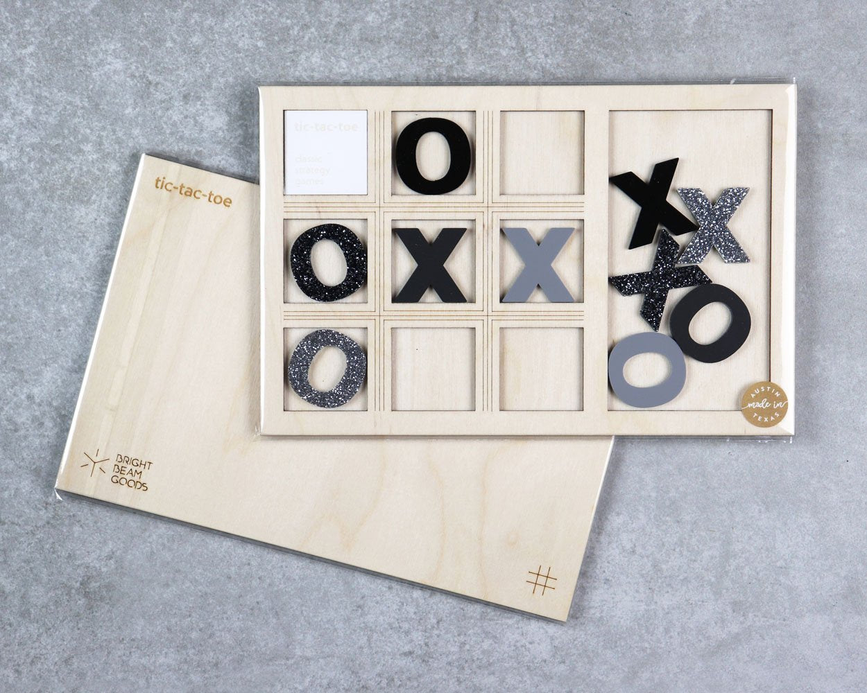 Stardust tic-tac-toe game in packaging